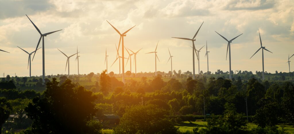 wind turbine farm hillside 5 Neden Güneş Enerjisi Yatırımı Karlı ve Geleceğe Yönelik Kazançlıdır